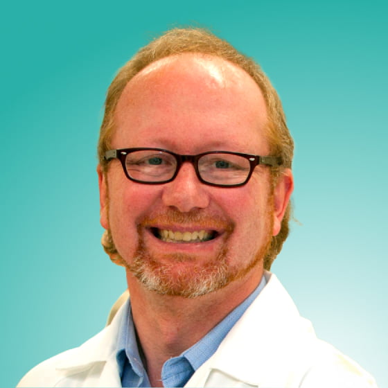 Prof Merlin Thomas