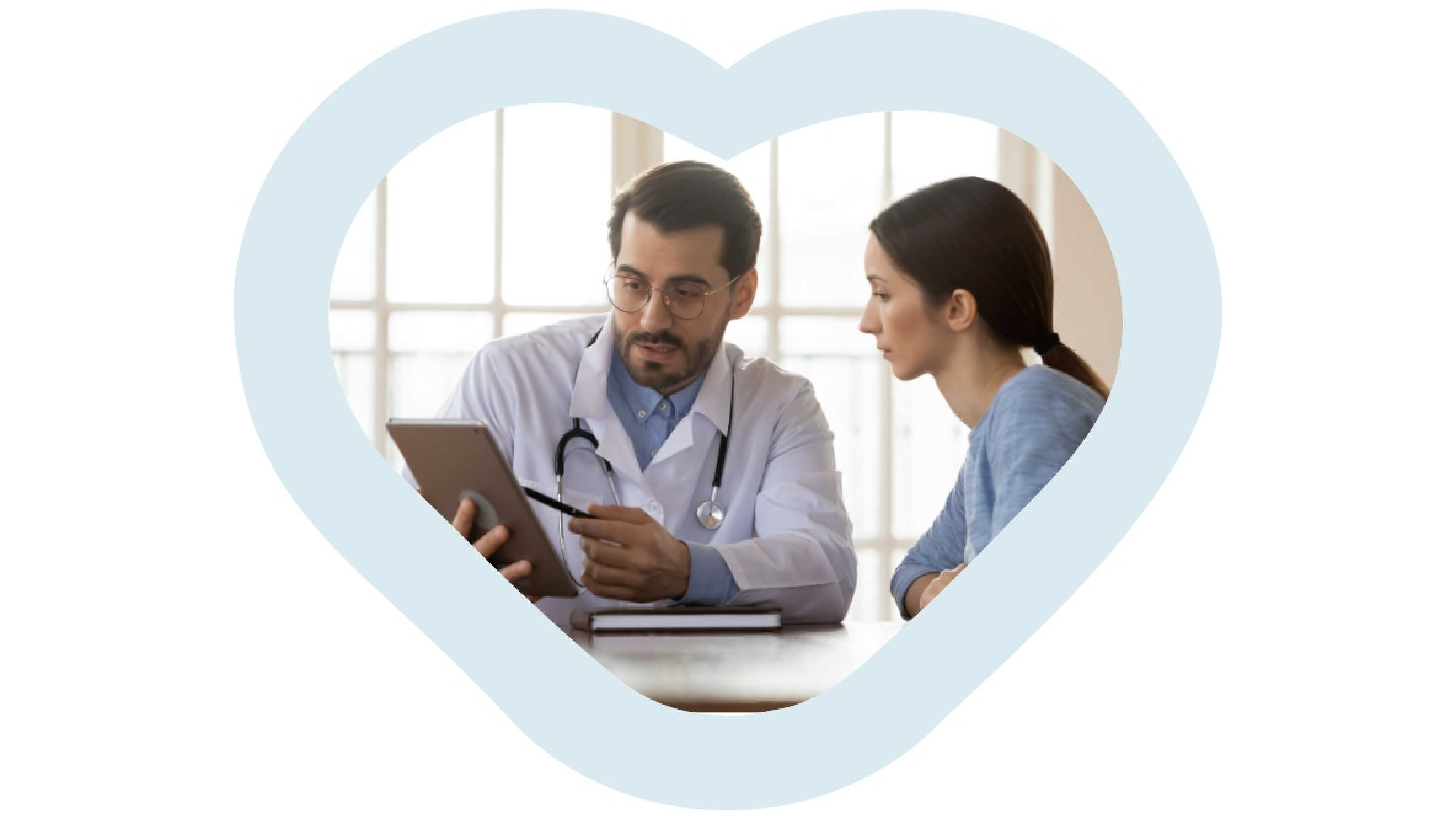 A male doctor talking to a female patient and explaining the medical history